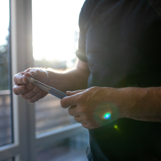 Adult preparing a GLP-1 medication injection, such as semaglutide, for weight loss or type 2 diabetes management